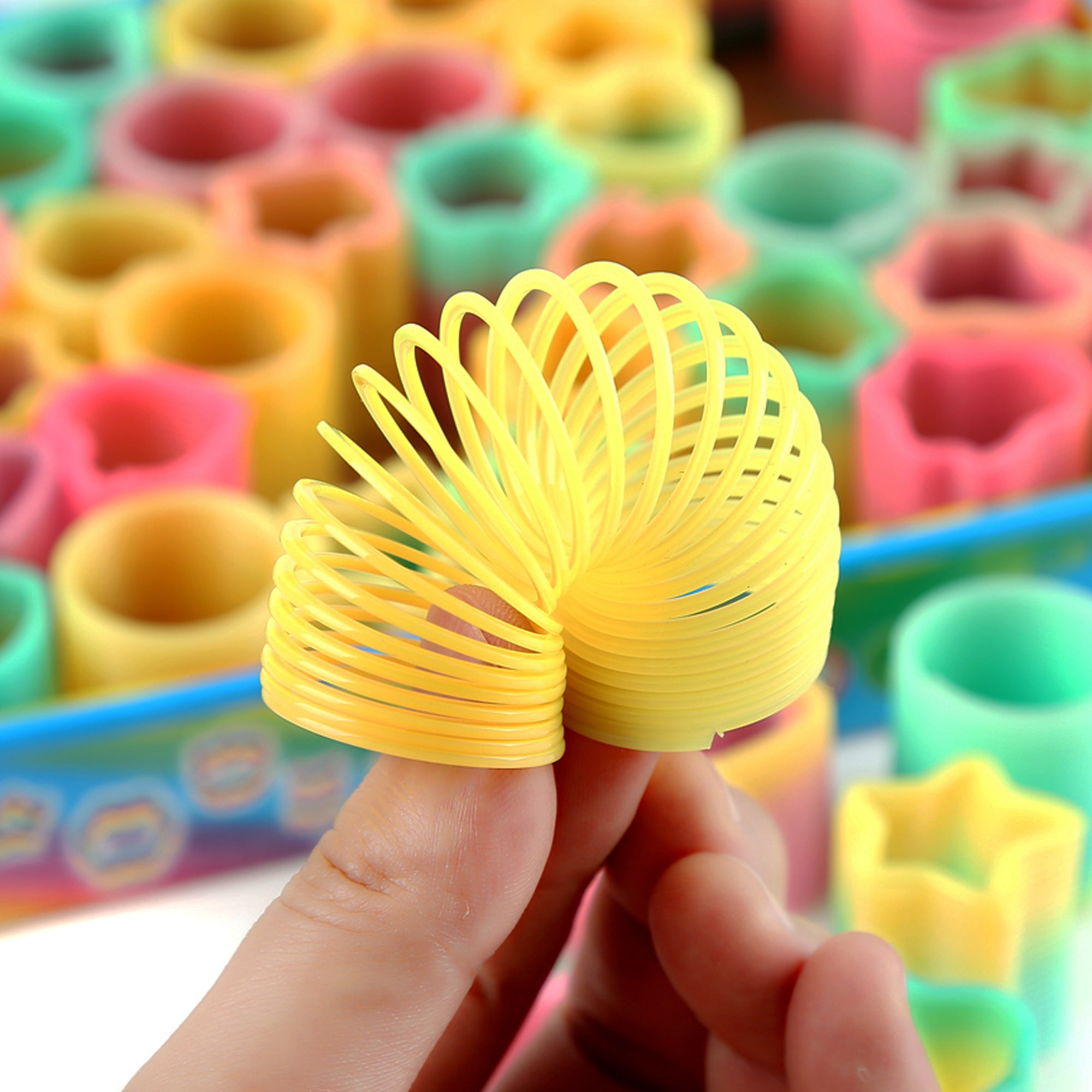 Spring Torap Toy Assorted Shapes Mini Rainbow Spring Toys - 50 pack – Windy City Novelties
